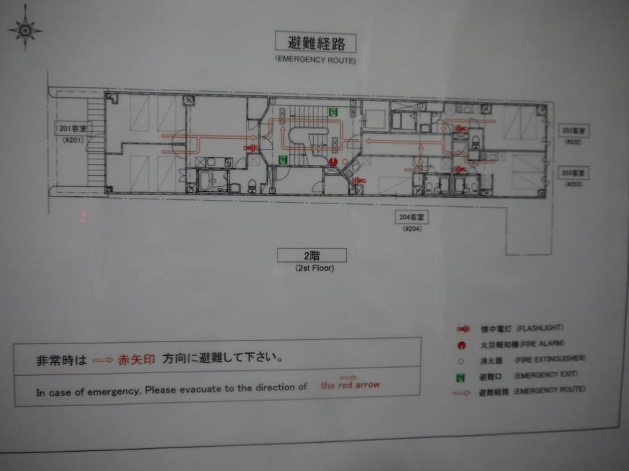 A map on the back of doors, that tells you the emergency route. And for your safety, please make sure you check it and walk the whole route though at least once.