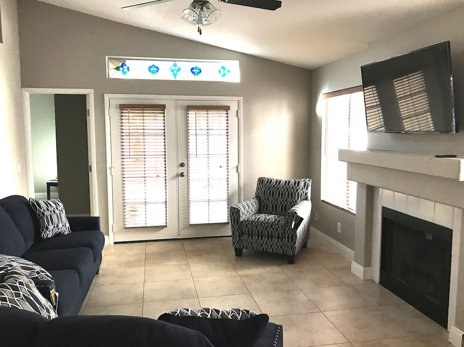 Main living area with 50 in. TV