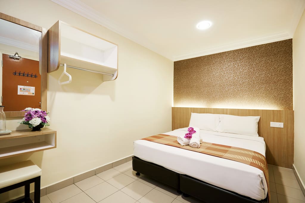 This is our Deluxe Double without Window Room. It comes with fitted bathroom, shower and WC, flat screen TV, cable TV, air-conditioning, working desk, vanity mirror, free drinking water. Bathroom amenities are provided, hair dryer and ironing facilities are on request.