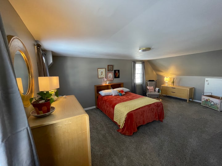 2nd floor, “kids room.”
Double / full bed. 
Plenty of storage and room to play!