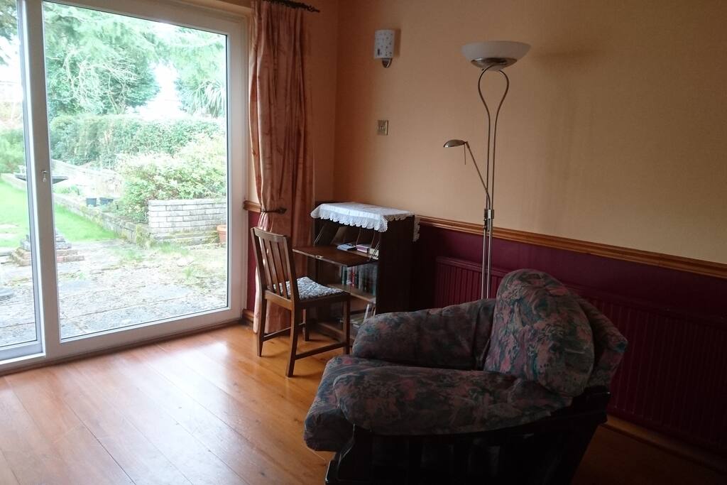 Desk and easy chair in bedroom