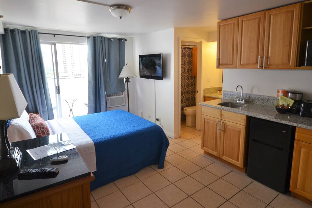 Granite counter tops, mini fridge, builtin cooktop, coffee maker, dishwares