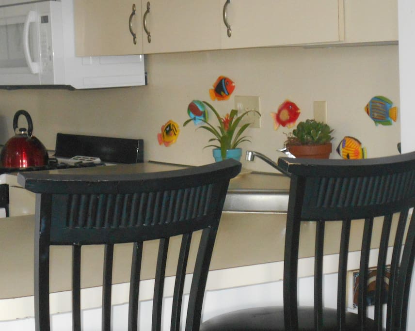 breakfast bar seats 2 and overlooks kitchen