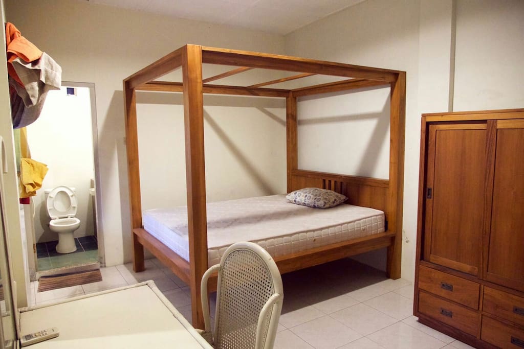 Beautiful master bed room with bathroom inside equipped with shower with hot and cold water