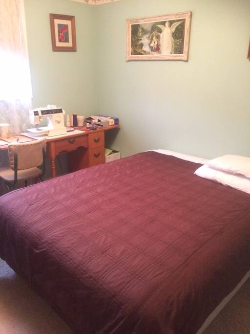 Large queen sized bed in a sunny, south facing room on the second floor.
