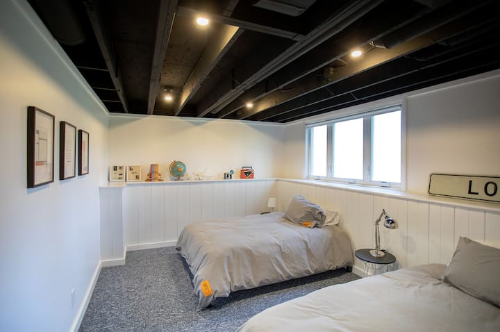 Lower level bedroom outfitted with 2) full sized beds.