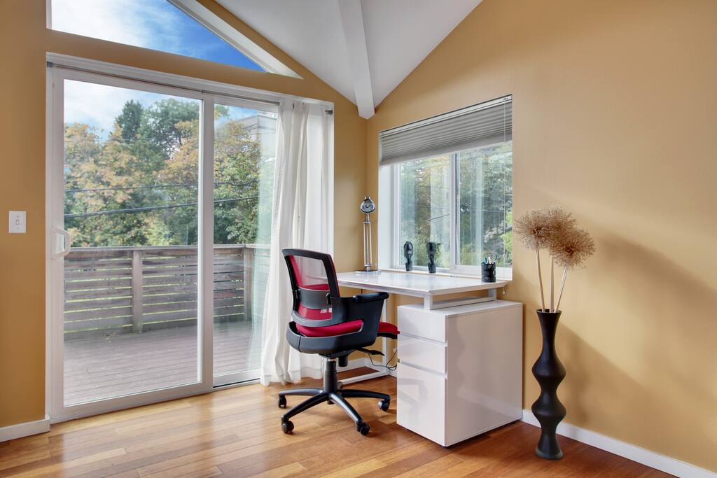 Pro work space with comfy chair & plenty of light.