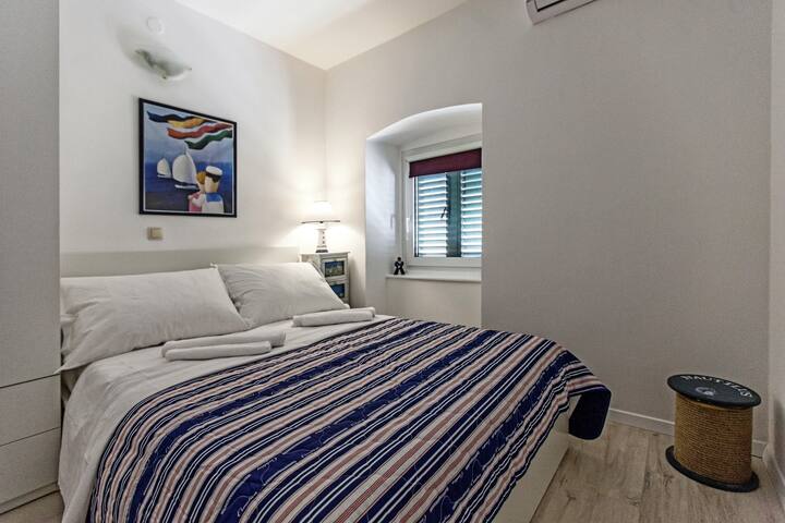 Beautiful bedroom with large double bed and A/C