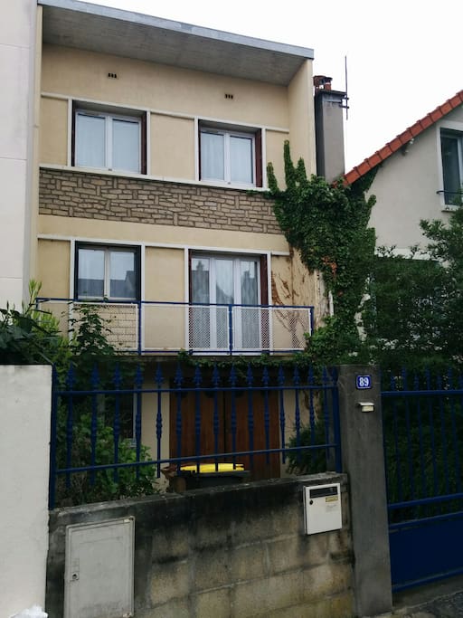 Entrance of the house, with 2 car parking places