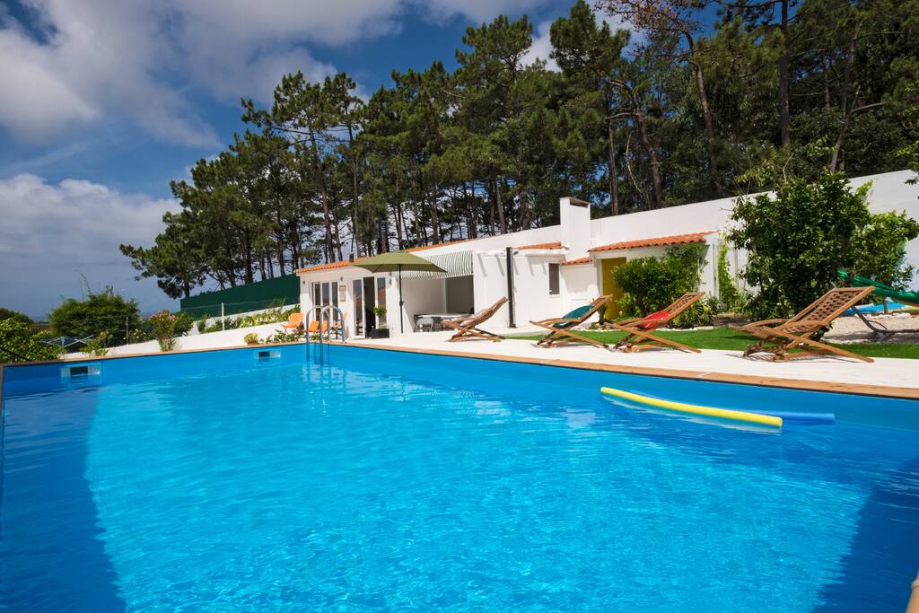 Piscina e casa