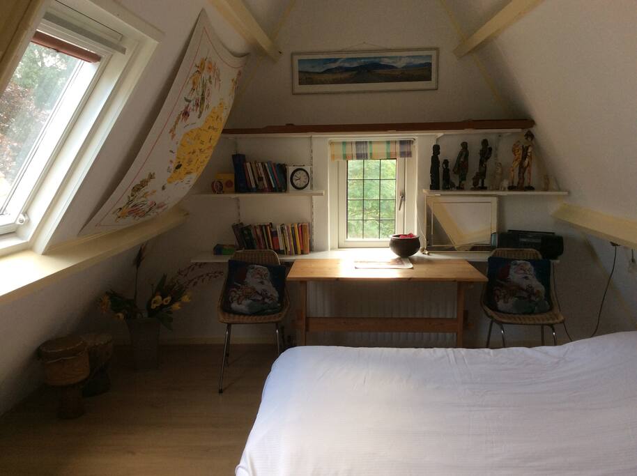 De tweepersoons slaapkamer