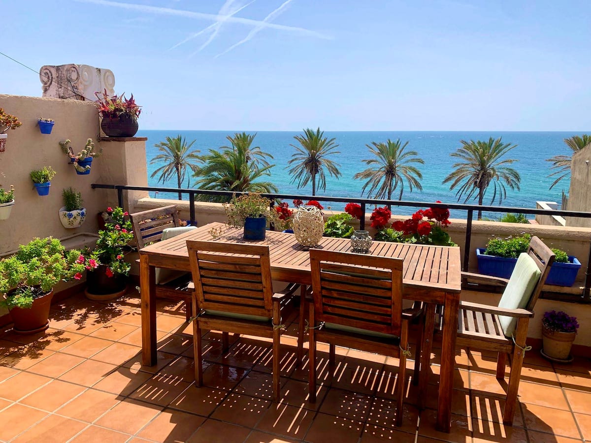 Spacious living room with terrace and sea views