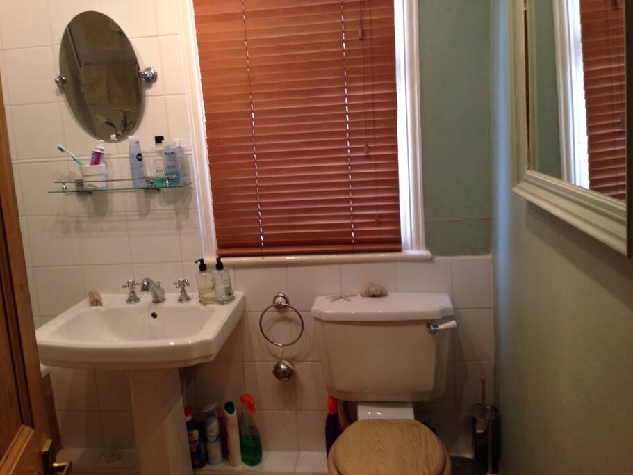 Bathroom with bath and shower