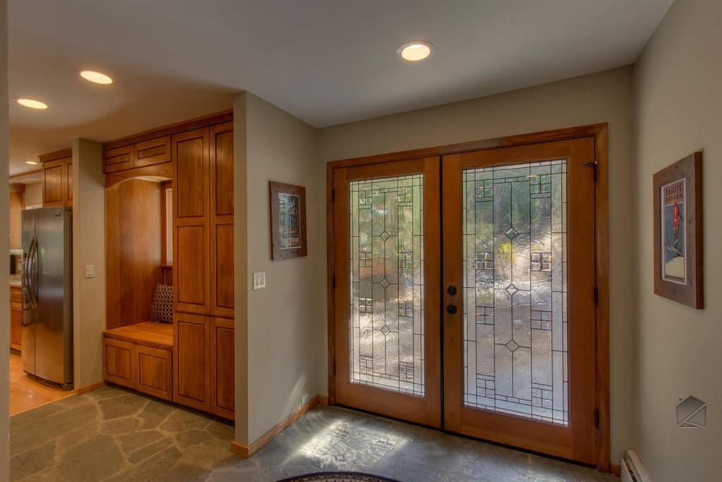Upon entry, you can see the tasteful design and wood finishes of this modern mountain home.