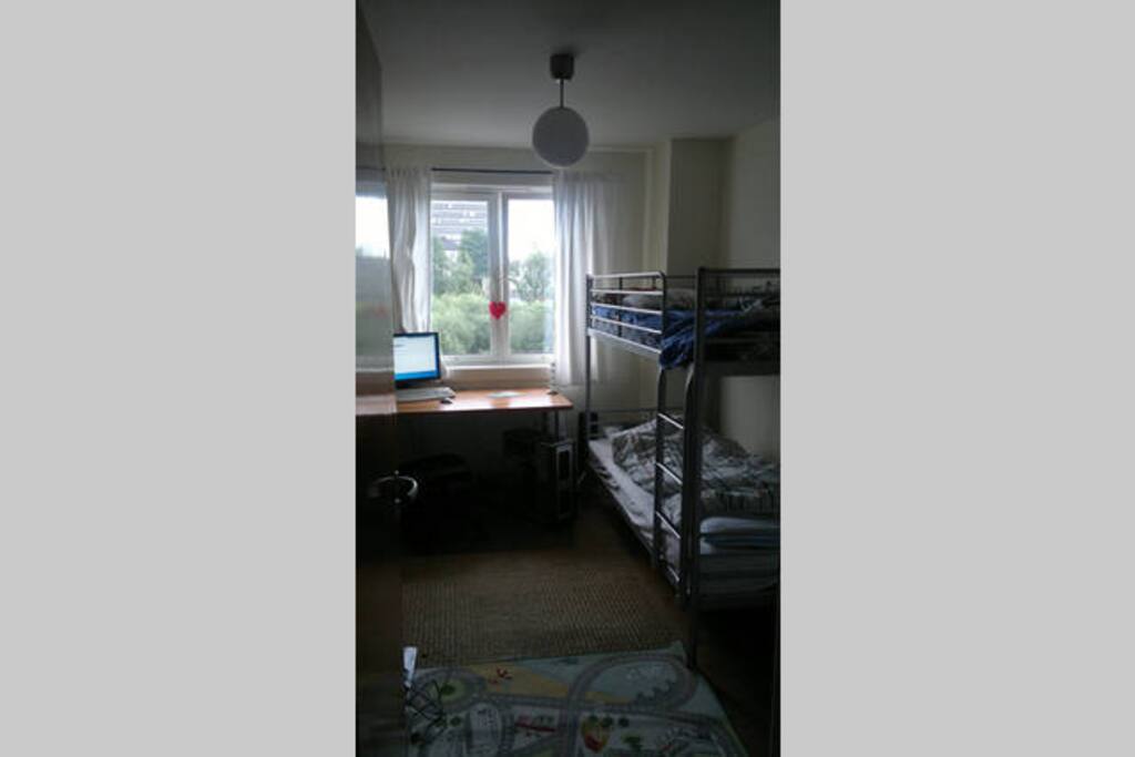 The small bedroom with bunk bed