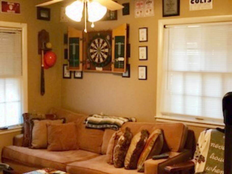 Living room? Darts anyone? Fan feels great! Grab a power nap on the couch!