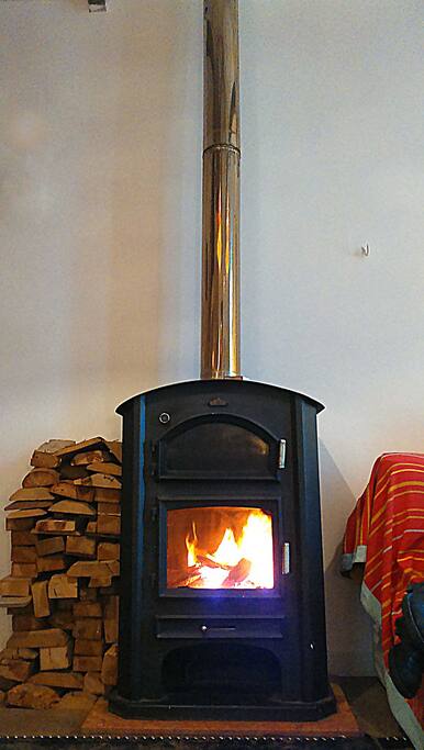 . Wood burning stove with oven (great for pizzas and bread) for those cold winter nights :)