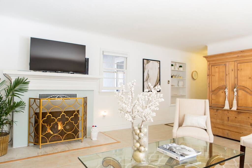 Welcome to your spacious living room. Enjoy the gas fire place while you explore the books, games, dvds and extra blankets in the pine cupboard.
