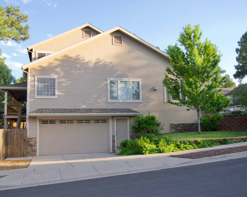 Side of house entry, with parking for 2 cars in front of garage (garage is not accessible)