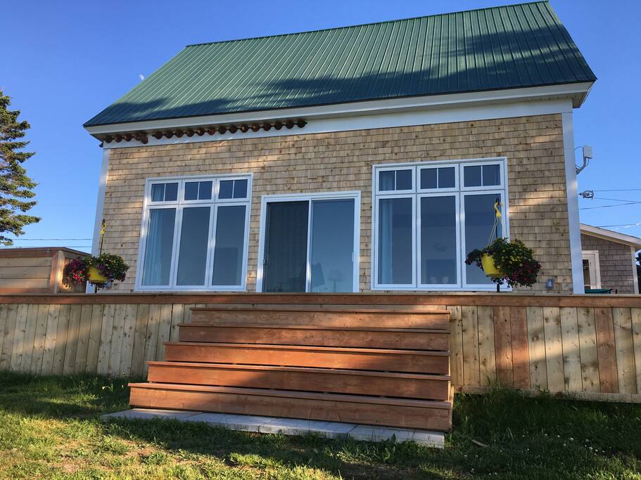 Front View of House & Deck with Swallow Nests on the Peak