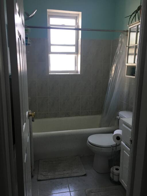 Bright bathroom with ocean view.