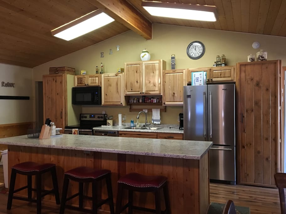 New updated kitchen with stainless appliances. 3 bar stools for extra seating.