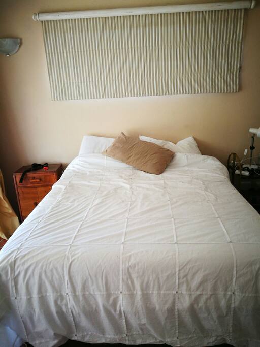 Main room downstairs with king size bed and en suite.
