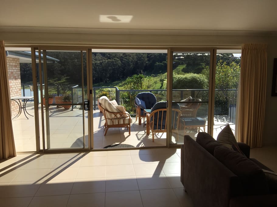View to the deck from the living room/kitchen.