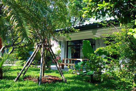 Stylish house in tropical garden