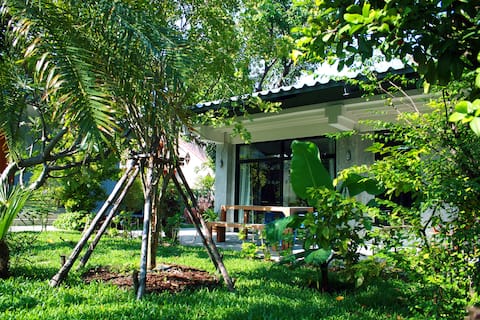Stylish house in tropical garden