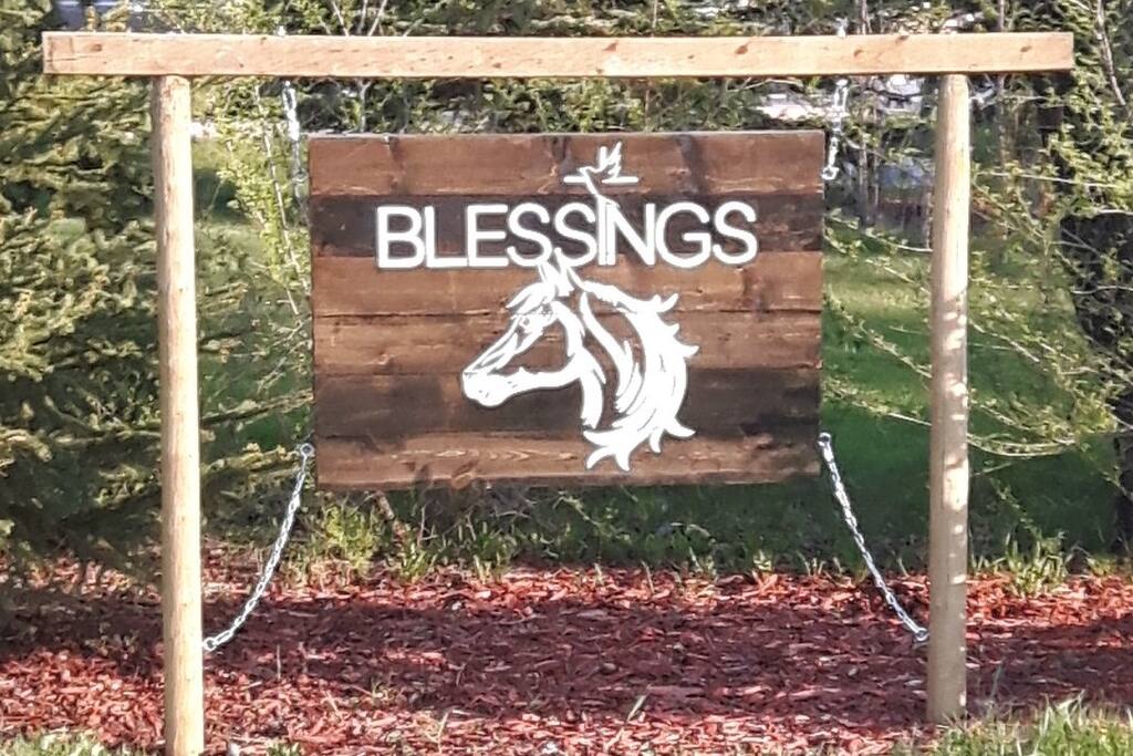 Blessing at the Creek welcome sign