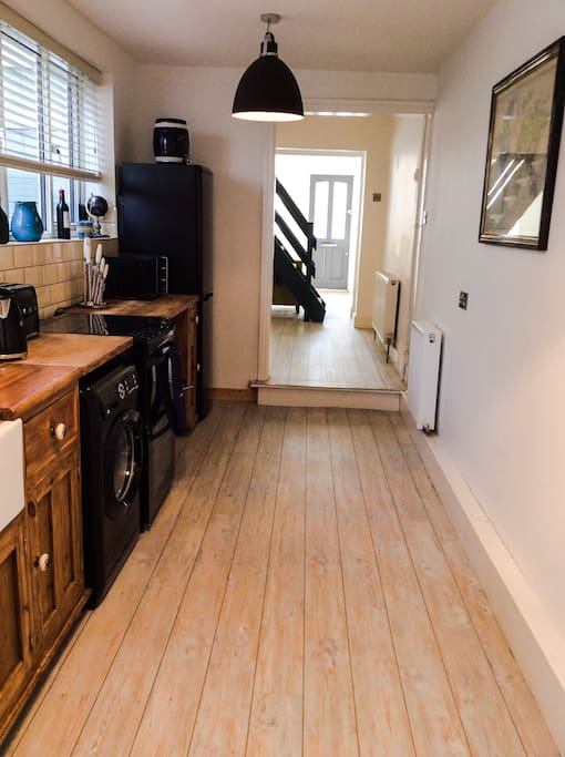Rustic kitchen fully equipped with everything you should need to make a family meal.