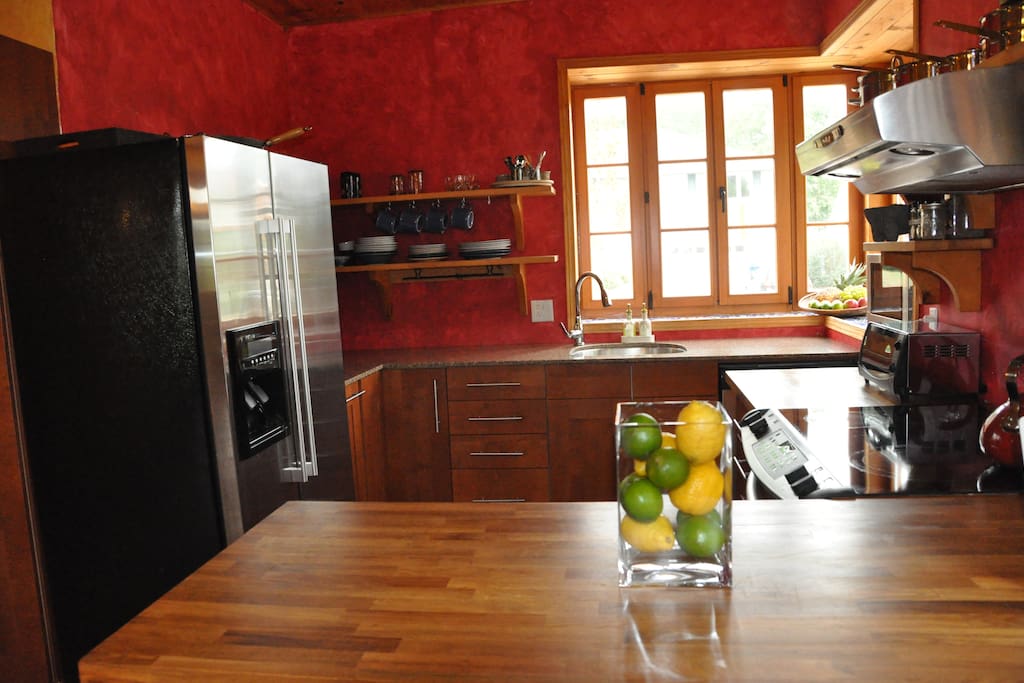 New, bright kitchen with peninsula and 2 stools