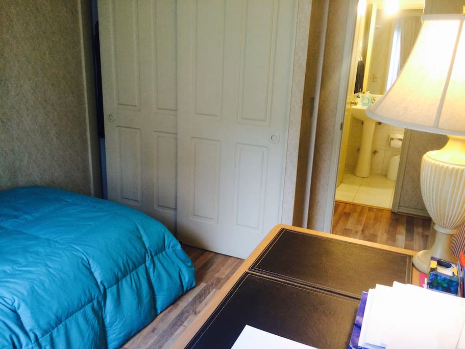 Bedroom for Rommie and bathroom