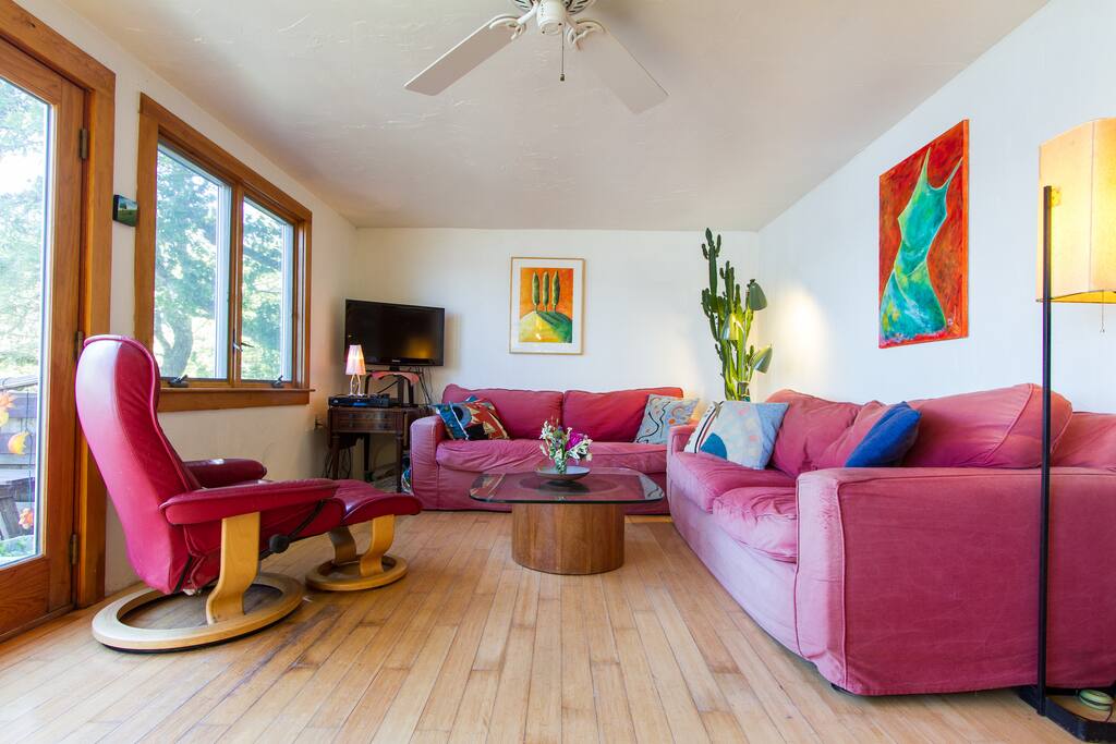 Comfortable sitting areas both inside and out! All with a water view