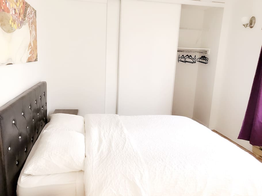 Big bedroom with queen size bed, comfortable mattress