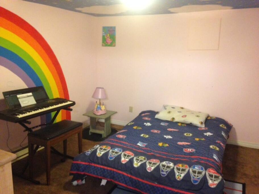 Separate bedroom with futon (and keyboard). Lots of closet space