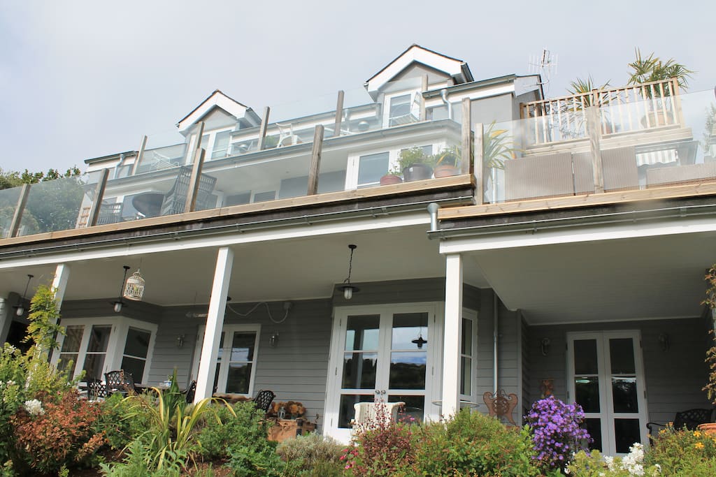 Exterior of the house - 2 bedrooms top floor, 3 bedrooms on ground floor all with private balcony or veranda and glorious views