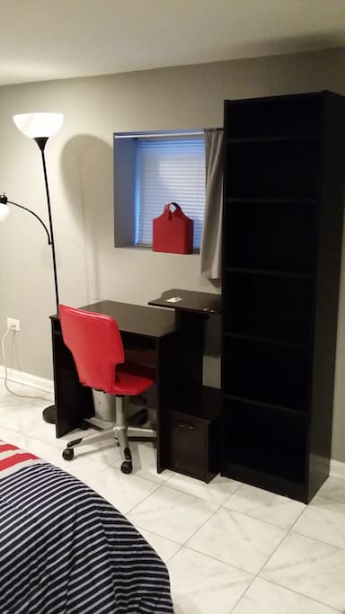 Well lit desk and good shelf space for all your clothing and other storage needs