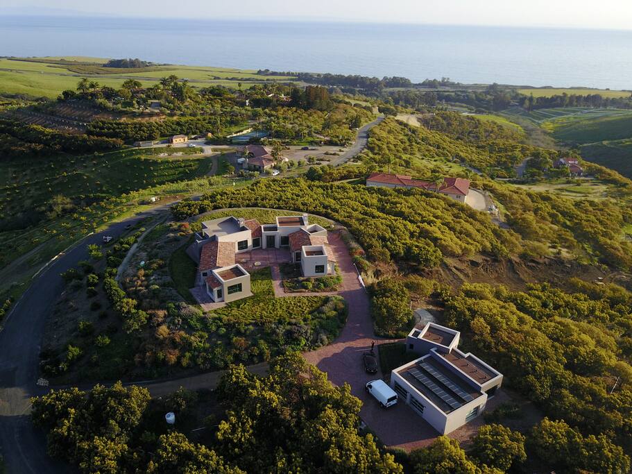 The Ranch with the Guesthouse in the foreground and the main house in the photo center. The Pacific is in view from everywhere. Taken April 2017
