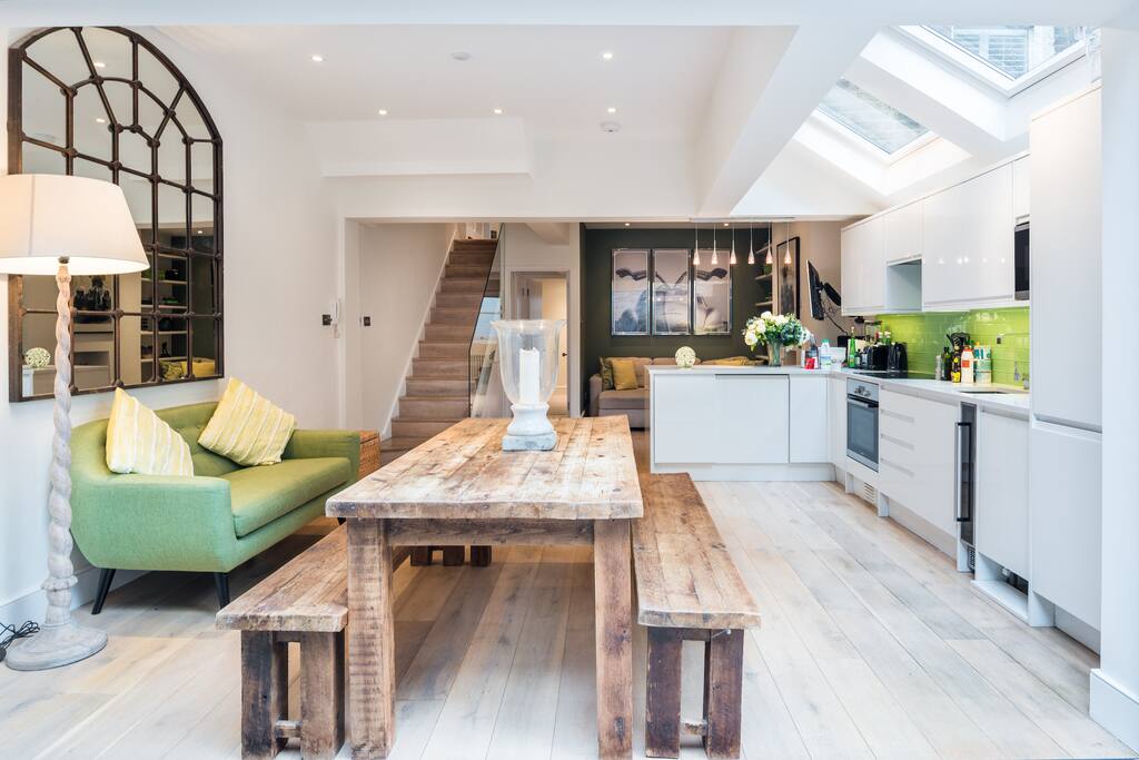 Living area with large wooden dining table