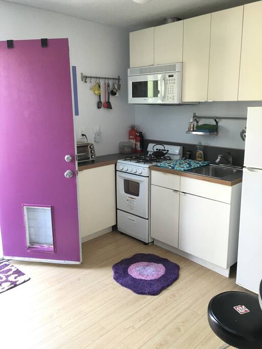 New Kitchen, all amenities. Microwave, small toaster oven, bullet blender.
