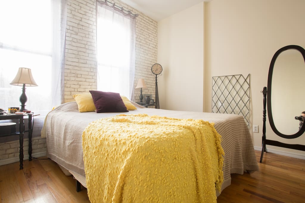 Large bedroom with queen bed.