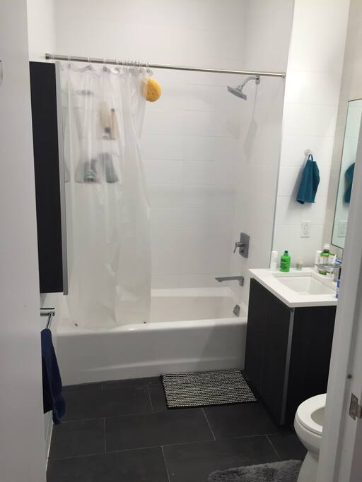 Modern bathroom with waterfall shower, very hot but soft for the perfect mix