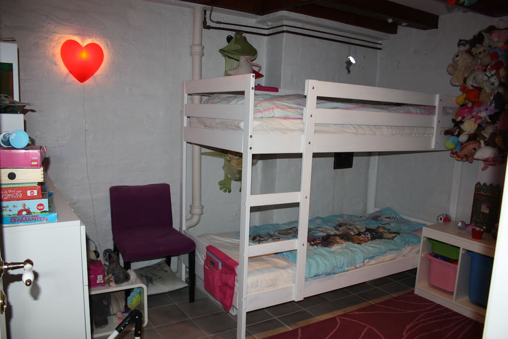 Childrens' bedroom with full-size bunk bed