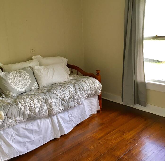 Bedroom features a twin-sized trundle bed - the second bed rolls out or can pop up to form a king sized bed.