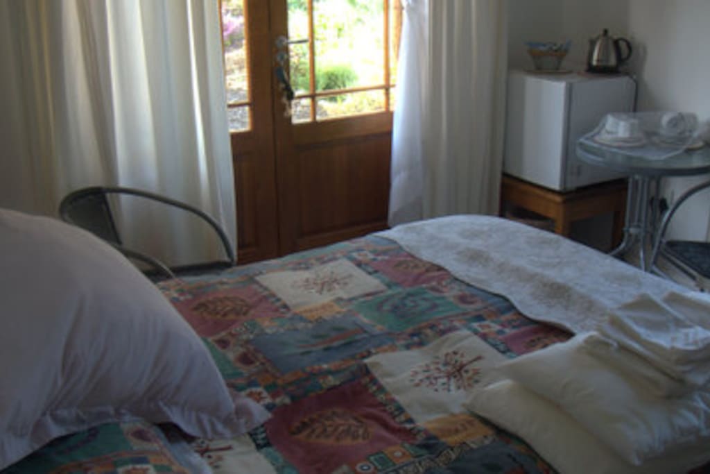 Comfortable double bed - lovely view of the garden