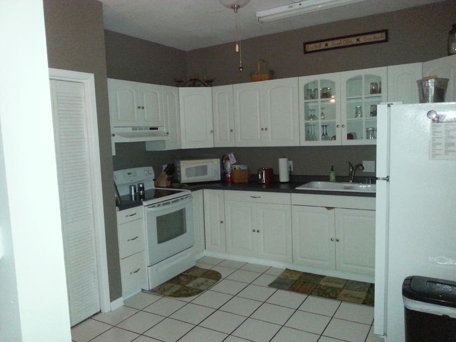 Large fully stocked kitchen.