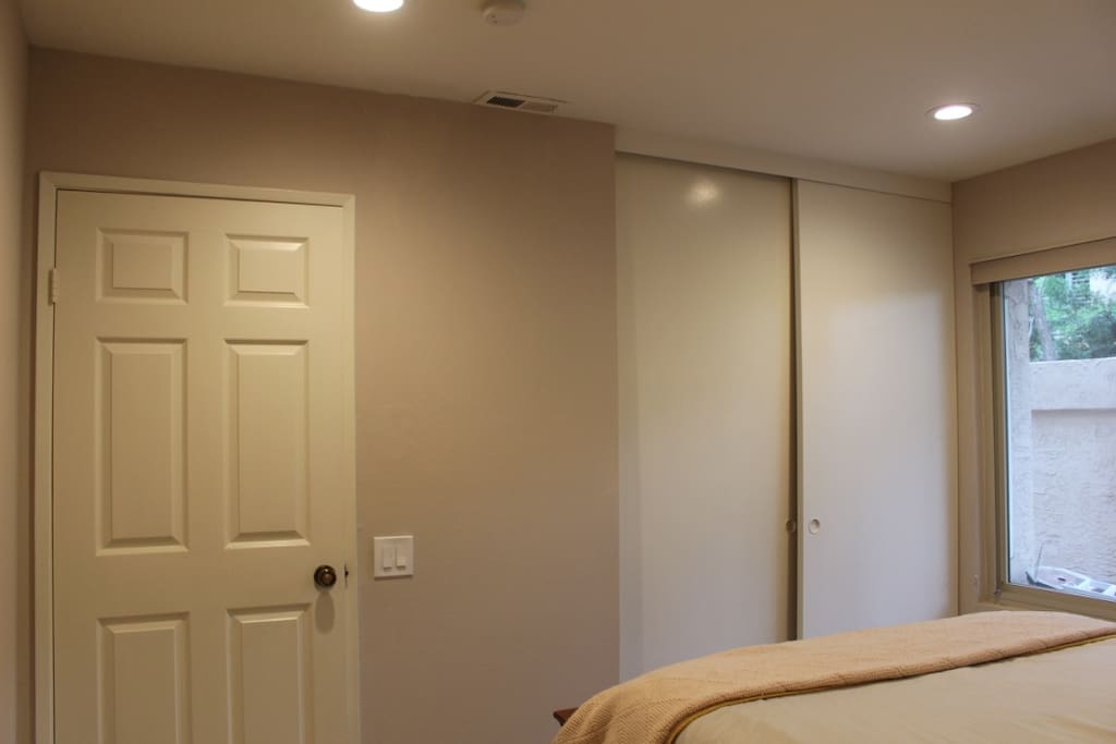 Closet space with interior dresser.