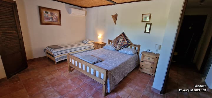 Double bed and two singles.
You can move the singles or keep them here.